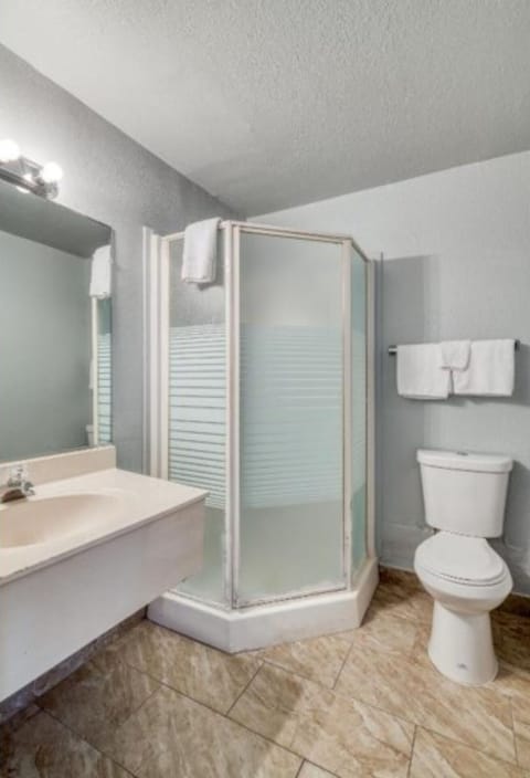 Room, 2 Double Beds | Bathroom | Shower, free toiletries, towels