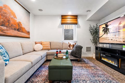 Relax in the movie room with ample seating and a large TV equipped with a stereo sound system for ultimate entertainment.
*The electric fireplace is taken out & is currently shelving with the stereo sound system
