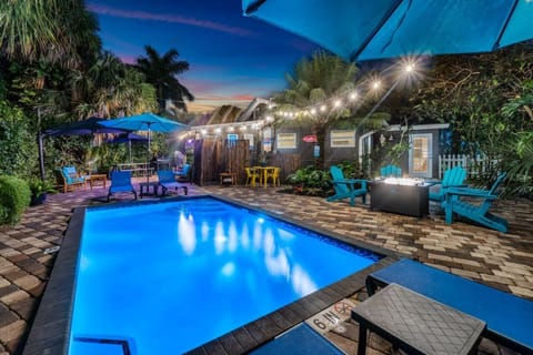 Backyard provides Total Privacy, Heated Pool & Shower, Palm Trees Everywhere