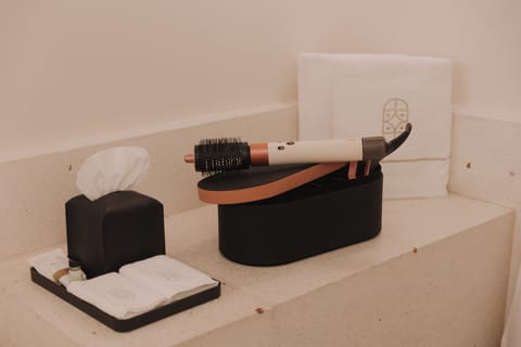 Rainfall showerhead, designer toiletries, hair dryer, towels