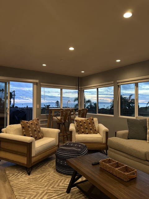 Enjoy the breathtaking ocean views from the comfort of this cozy living room