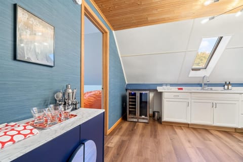 Beverage area with sink and wine refrigerator