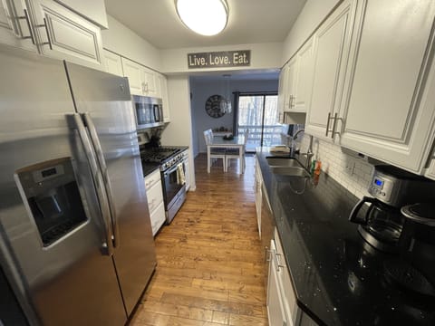 Granite countertops, plenty of cooking supplies, Keurig and regular coffee maker
