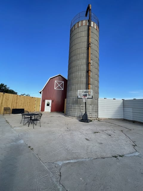Enjoy the beautiful barnyard patio right beside the silo.  The patio where cows used to lounge and chew their cud. The silo used to hold feed for the cows and the barn used to house cows and horses for the night.