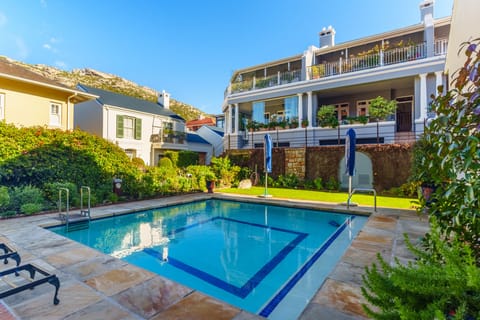 Townhouse looks onto swimming pool
