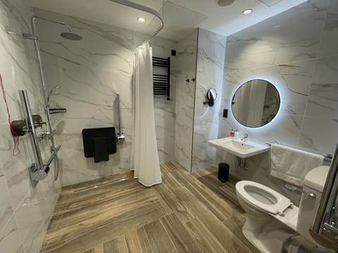 Accessible Room, No windows | Bathroom | Shower, hair dryer, bathrobes, slippers