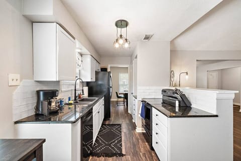 Kitchen: Sleek design meets functionality—whip up your favorite meals in style.