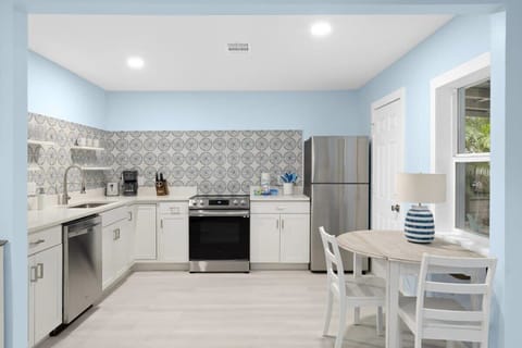 Great Open Concept Kitchen (Fully Equipped). Expandable Leaf Dining Table with 4 Chairs (Two More in Closet if Needed)