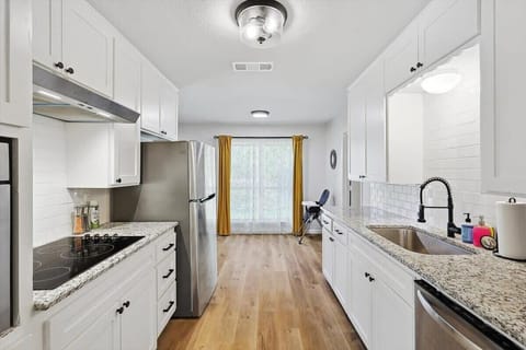 This fully equipped kitchen with plenty of counter space and cabinets is where memories are made, family dinners are shared, and culinary adventures unfold!