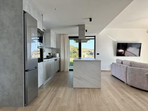 A large kitchen with easy access to terrace!