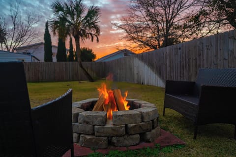 Outside firepit with smore cookers available in the kitchen. 