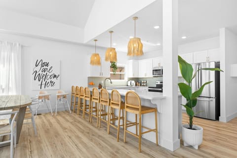 Open Kitchen flowing to the Dining & Sitting Area