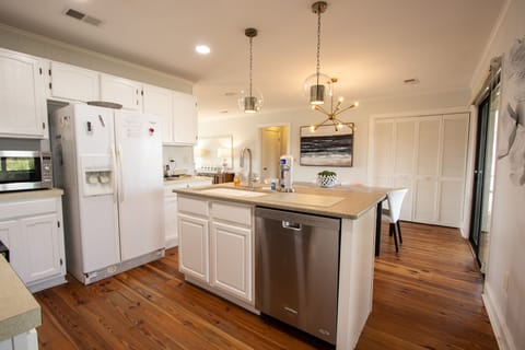 Kitchen, 2 seats at bar, access to screened porch