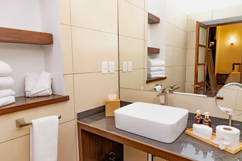 Standard Room | Bathroom | Hair dryer, towels, soap, shampoo