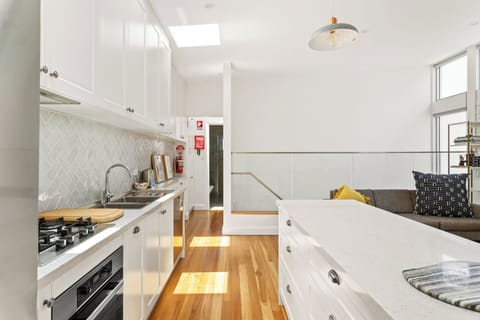 Fully equipped kitchen with coffee machine and dishwasher