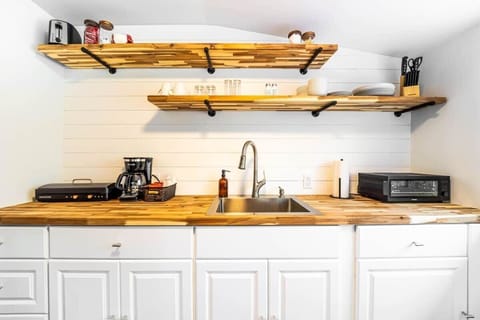 Room 1A: Electric 2 top burner, microwave, toaster, toaster oven & air fryer combo; perfect for all of your food prep needs!