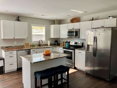 Fully equipped kitchen, stocked with all the kitchen basics. Standard drip coffee machine, please bring your own coffee to use it.