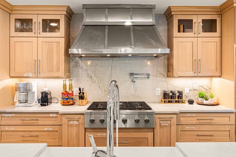 Fully stocked gourmet Kitchen open to two huge great rooms