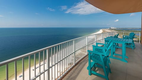 Experience seemingly endless coastline views from your corner balcony as waves lap the shore