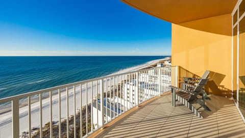Settle into the balcony chairs to watch the gulf stretch along the beach and feel the coastal breeze