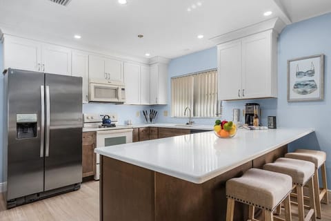 Pull up a bar stool and chat with the chef!