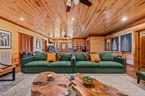 Epic game room with 86" 4K TV perfect for movie blockbusters, or streaming.