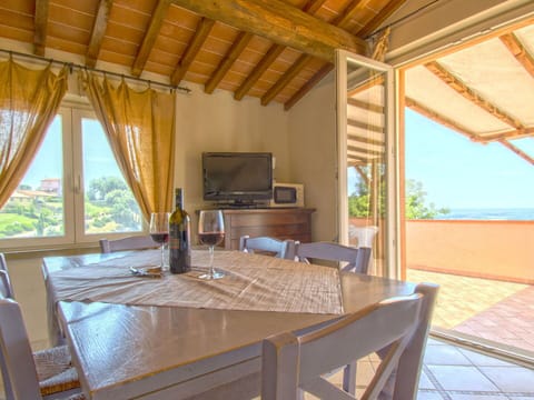 Property, Table, Wood, Shade, Interior Design, Architecture, Cottage, Tree, Floor, Beam