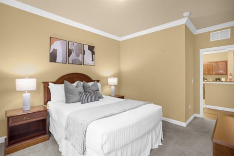 Two master bedrooms, both with nightstands on both sides of the bed and TV!
