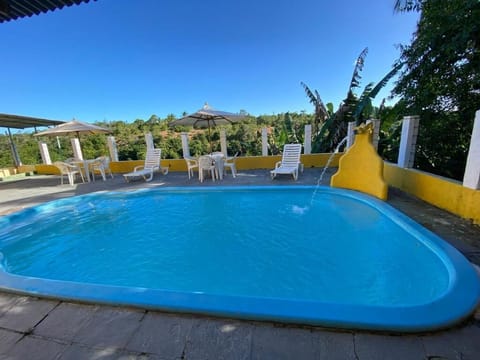Outdoor pool, open 10:00 AM to 8:00 PM, pool umbrellas, sun loungers