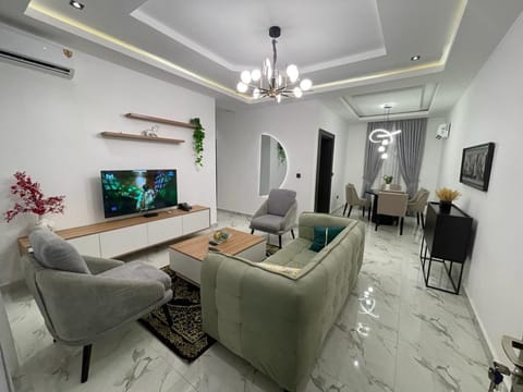 Executive Apartment | Living area | Flat-screen TV