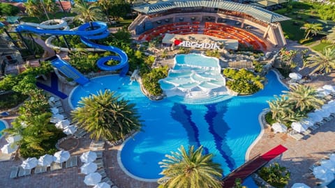 Indoor pool, seasonal outdoor pool, pool umbrellas, sun loungers