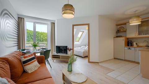 Apartment (405) | Living area | Flat-screen TV