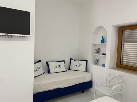 Family Room | Free minibar, individually decorated, individually furnished, desk