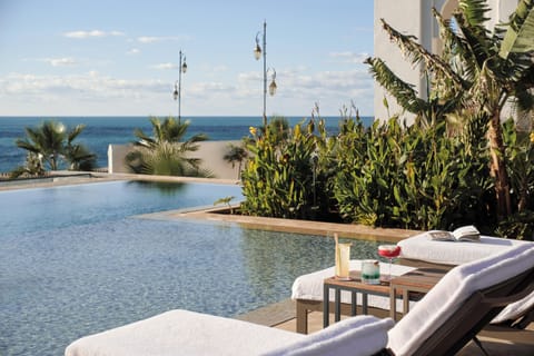 2 outdoor pools, pool umbrellas, sun loungers