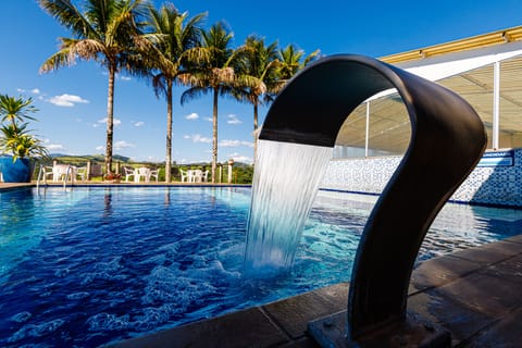 Indoor pool, outdoor pool, open 9:00 AM to 9:00 PM, pool umbrellas