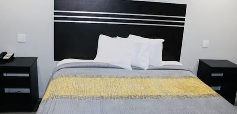 Room, 1 King Bed, Non Smoking | Desk, iron/ironing board, free WiFi, bed sheets