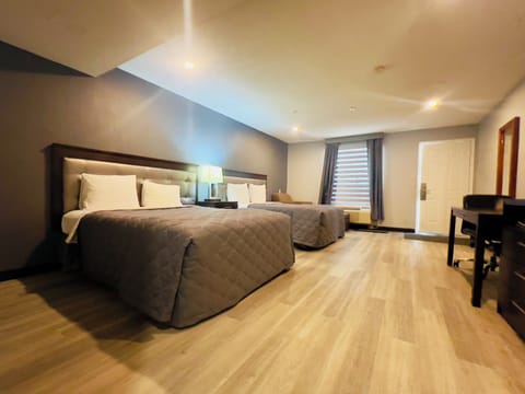 Room with 2 Queen Beds | Desk, soundproofing, iron/ironing board, rollaway beds