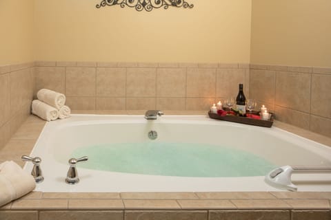 Room, 1 Queen Bed, Jetted Tub | Bathroom | Hair dryer, towels