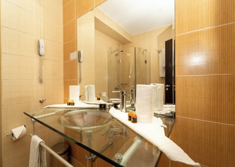 Shower, free toiletries, hair dryer, slippers