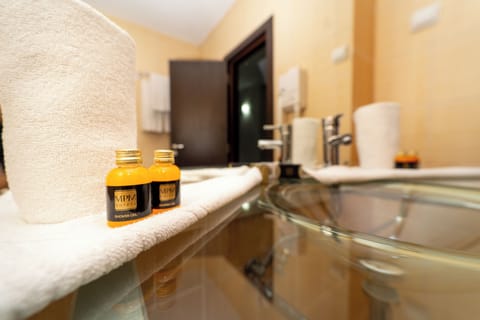 Shower, free toiletries, hair dryer, slippers