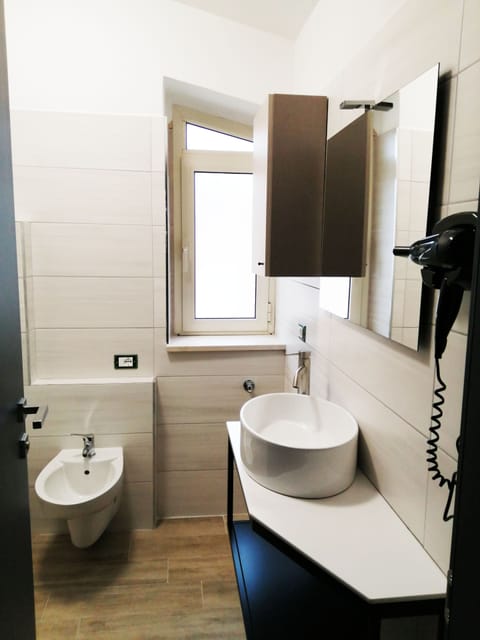 Standard Condo | Bathroom | Shower, free toiletries, hair dryer, bidet