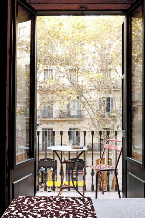 Standard Double Room, Balcony, City View | Minibar, in-room safe, desk, blackout drapes