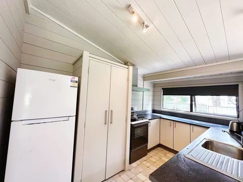 Family Bungalow | Private kitchen | Mini-fridge, oven, stovetop, electric kettle