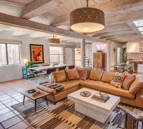 Design Loft, 2 Bedrooms, Balcony, City View | Living area | Flat-screen TV