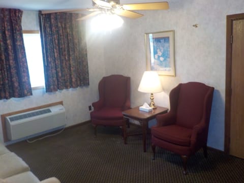 Deluxe Suite, 1 King Bed with Sofa bed, Poolside | Living area | 43-inch flat-screen TV with digital channels, TV