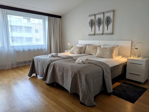 Apartment, 1 Bedroom | 1 bedroom, desk, blackout drapes, iron/ironing board