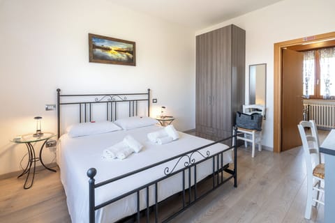 Economy Apartment, 2 Bedrooms, Kitchenette | Blackout drapes, iron/ironing board, free WiFi, bed sheets