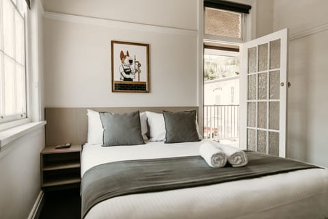 Queen Balcony Room | Iron/ironing board, WiFi (free), bed sheets