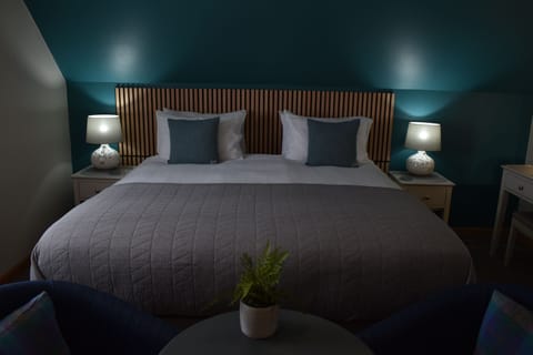 Double or Twin Room | Blackout drapes, iron/ironing board, WiFi, bed sheets