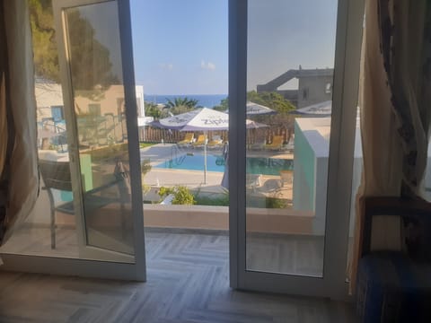 Deluxe Suite, Multiple Bedrooms, Sea View | Terrace/patio